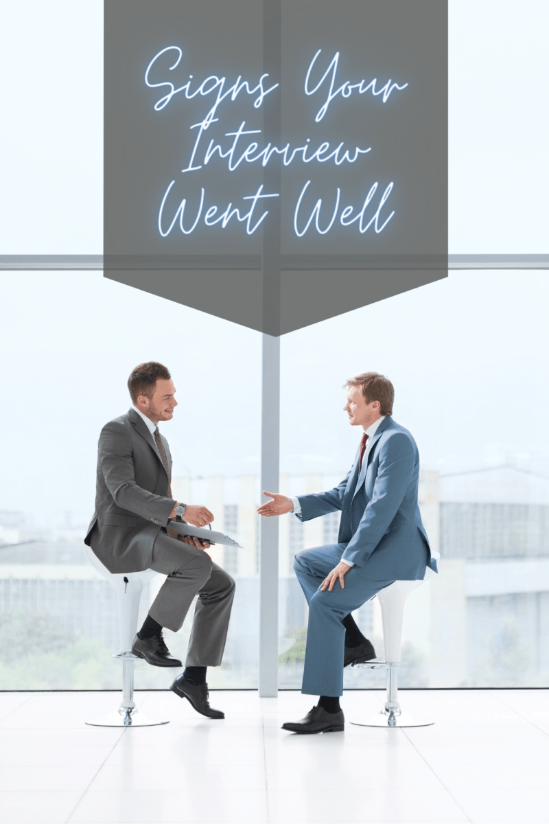Two men in suits talking 